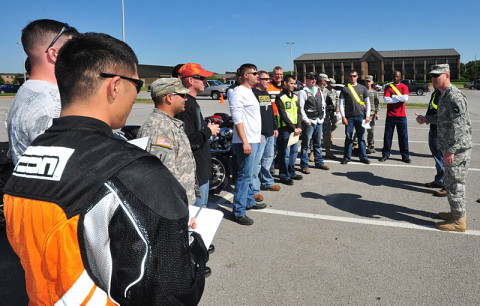 U.S. Army Lt. Col. Joel D. Hamby, the 4th Brigade Combat Team, 101st Airborne Division's rear-detachment commander, discusses the importance of motorcycle safety awareness with Currahee motorcycle owners representing all the battalions and various levels of rider experience within the brigade, May 15, 2013, as part of the brigade's observance of Motorcycle Safety Awareness Month at Fort Campbell, Ky. (U.S. Army photo by Sgt. Kimberly K. Menzies, 4th Brigade Combat Team Public Affairs)