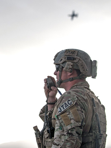 PAKTIA PROVINCE, Afghanistan - U.S. Air Force Staff Sgt. Justin Marsh, a joint tactical air controller, guides an A-10 Thunderbolt II onto an insurgent’s position during Operation Sham Shir, April 24, 2013, Sahak, Afghanistan.  (U.S. Army National Guard Sgt. Joshua Edwards)