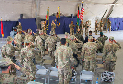 U.S. Army Soldiers and Afghan National Security Force members, attending the transfer of authority ceremony, salute the National flags of Afghanistan and the United States of America during the playing of each country’s National Anthem at Forward Operating Base Salerno, on May 22, 2013. The transfer of authority ceremony signifies the beginning of the Currahee’s mission as a partner with their Afghan National Security Force partners. (Photo by U.S. Army Sgt. Justin Moeller, 4th Brigade Combat Team, 101st Airborne Division)