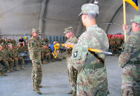 Command Sgt. Maj. Michael A. Grinston, brigade command sergeant major, and Col. Val C. Keaveny Jr., brigade commander of the 4th Brigade Combat Team, 101st Airborne Division, uncase the Currahee’s colors during a transfer of authority ceremony at Forward Operating Base Salerno, on May 22, 2013. The transfer of authority ceremony signifies the beginning of the Currahee’s mission as a partner with their Afghan National Security Force partners.