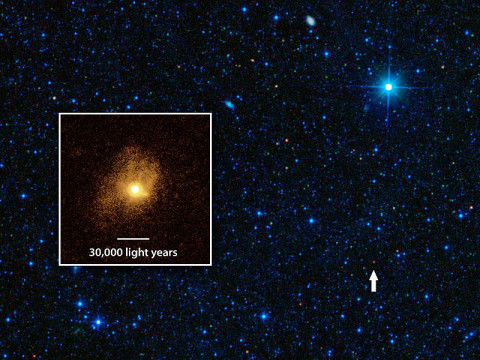 The tiny red spot in this image is one of the most efficient star-making galaxies ever observed, converting gas into stars at the maximum possible rate. (Image credit: NASA/JPL-Caltech/STScI/IRAM)