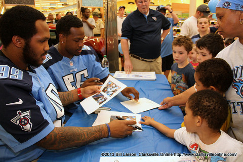 Akeem Ayers and Jurrell Casey visit with young fans at the Lowes Drive Kroger's in Clarksville, TN on Tuesday