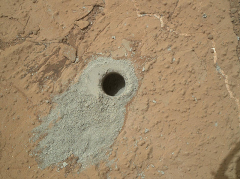 NASA's Mars rover Curiosity drilled into this rock target, "Cumberland," during the 279th Martian day, or sol, of the rover's work on Mars (May 19, 2013) and collected a powdered sample of material from the rock's interior. Analysis of the Cumberland sample using laboratory instruments inside Curiosity will check results from "John Klein," the first rock on Mars from which a sample was ever collected and analyzed. (Image Credit: NASA/JPL-Caltech/MSSS)