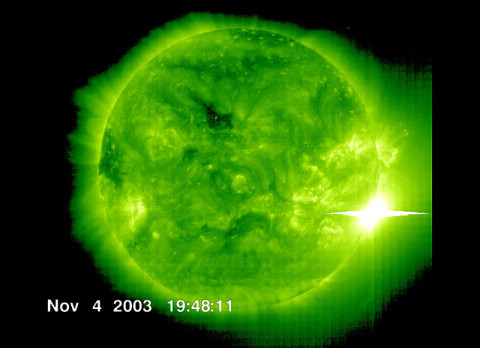 The Solar and Heliospheric Observatory spacecraft captured this image of a solar flare as it erupted from the sun early on Nov 4, 2003. This was the most powerful flare measured with modern methods, classified as an X28. (Credit: ESA and NASA/SOHO)