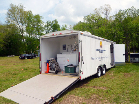 The Southern Baptist Disaster Relief provided much appreciated shower and clothes washing facilities on the grounds of the Carlisle Missionary Baptist Church. (Robert W. Wallace)