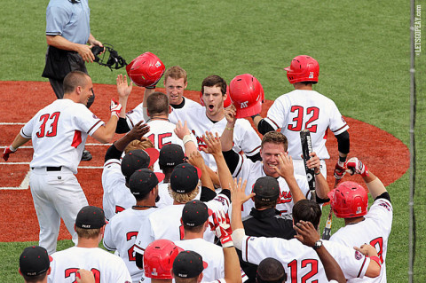 Designated hitter Michael Davis celebrates following his game-winning three-run home run against Florida, Friday, in NCAA Tournament play. (Lisa Kemmer)