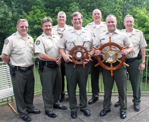 Tommy Stockling (left) and Nick Luper are with their respective awards after being introduced as the Tennessee Wildlife Resources Agency part-time Boating Officer and Boating Officer of the Year for 2012.  Also pictured are (from left) District 31 Lt. Tim Singleton, District 31 Cpt. Roy Cannon, Region III Maj. CJ Jaynes, Boating and Law Enforcement Division Chief Darren Rider, and Asst. Boating and Law Enforcement Chief Glenn Moates.