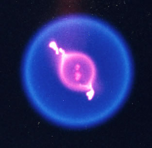 A color image of a burning fuel droplet. A color image of a burning fuel droplet.