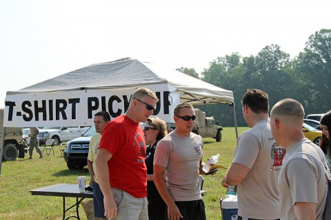 Lt. Col. Phillip J. Borders, the commander of the 326th Engineer Battalion, 101st Sustainment Brigade, 101st Airborne Division (Air Assault), encourages officers from his battalion before the 2013 Eagle Challenge Fitness Tour 12k obstacle course, June 8, at Fort Campbell. He advises his young officers that learning is their first job. (U.S. Army photo by Sgt. Leejay Lockhart, 101st Sustainment Brigade Public Affairs)