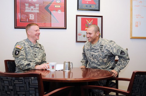 Lt. Col. Phillip J. Borders, the commander of the 326th Engineer Battalion, 101st Sustainment Brigade, 101st Airborne Division (Air Assault), and his senior enlisted adviser, Command Sgt. Maj. Ramon M. Fisher, share a laugh during a conversation about the battalion March 14, at Fort Campbell. They attribute their similar approach to the military to the fact they both spent time in the 326th as younger Soldiers. (U.S. Army photo by Sgt. Leejay Lockhart, 101st Sustainment Brigade Public Affairs)