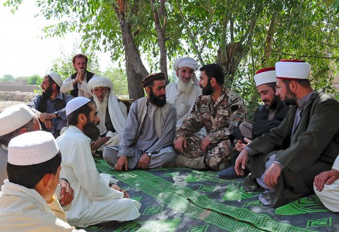 Maj. Abdel Latif, along side Imams Capt. Imam Sabri Al Qudah and Lt. Imam Ahmad Shemayli, with the Jordanian Engagement Team, based out of Bagram Air Field, Afghanistan, talk with village elders and mullahs about the Amman message during a meeting June 11, 2013, in Khowst province, Afghanistan. (U.S. Army photo Sgt. Justin Moeller, 4th Brigade Combat Team Public Affairs)