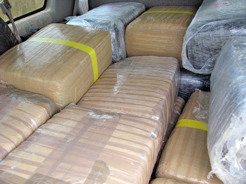 20 bundles of shrink wrapped marijuana weighing 457 pounds was found in the Suburban.