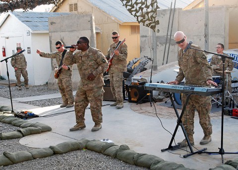 The 101st Airborne Division (Air Assault) Band ‘Ambush’ performs at Forward Operating Base Lightning. (U.S. Army National Guard photo by Staff Sgt. Jacqueline Fitzgerald) The 101st Airborne Division (Air Assault) Band ‘Ambush’ performs at Forward Operating Base Lightning. (U.S. Army National Guard photo by Staff Sgt. Jacqueline Fitzgerald)