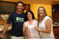 Clarksville Running Club President Mike Heiser; Project F.U.E.L. founder Denise Skidmore; and Marlene Deem, Race Director for the Wilma Rudolph 5k-10k Run after the check presentation