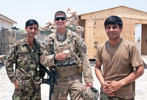 A U.S. Army Soldier with Security Forces Advisory and Assistance Team Blackhorse, 1st Battalion, 327th Infantry Regiment, 1st Brigade Combat Team, 101st Airborne Division, poses with two Afghan National Army soldiers at former Forward Operating Base Connolly, Nangarhar Province, Afghanistan, July 7, 2013. (U.S. Army photo by Sgt. Margaret Taylor, 129th Mobile Public Affairs Detachment)