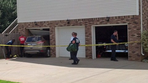 Ford SUV leaves roadway and crashes into house at 3201 Twelve Oaks Boulevard.