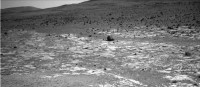 This view from NASA’s Mars Exploration Rover Opportunity shows an area where a pale-toned geological unit called the “Burns Foundation,” in the foreground, abuts a different geological unit. The darker unit, believed to be older, marks the edge of “Solander Point,” a raised segment of the western rim of Endeavour Crater. (Image credit: NASA/JPL-Caltech)