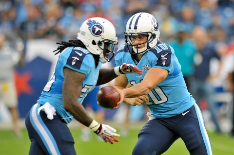 Tennessee Titans quarterback Jake Locker (10) hands off to Titans running back Chris Johnson (28). (Jim Brown/USA TODAY Sports)