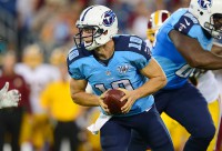 Tennessee Titans quarterback Jake Locker (10) drops back into the pocket against the Washington Redskins during the first half at LP Field. (Don McPeak/USA TODAY Sports)