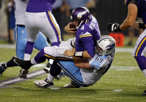 Tennessee Titans defensive tackle Zach Clayton (69) sacks Minnesota Vikings quarterback McLeod Bethel-Thompson (4) in the third quarter at Mall of America Field at H.H.H. Metrodome. Vikings win 24-23 on August 29th, 2013. (Bruce Kluckhohn - USA TODAY Sports)