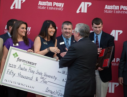 Farm Credit Mid-America staff members present a $50,000 check to Austin Peay State University. (Beth Liggett - APSU staff)