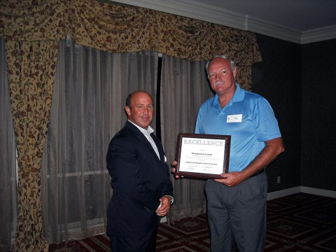 Montgomery County Parks and Recreation Director Jerry Allbert (Left) accepts the Parks and Recreation Award from GNRC President Scott Foster (Right) at the annual awards banquet.