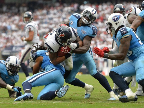 Houston Texans running back Arian Foster (23) rushes for a touchdown against the Tennessee Titans during the second half at Reliant Stadium. The Texans won 30-24:(photo by Thomas Campbell-USA TODAY Sports)