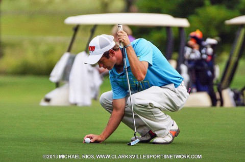 Tyler Guy prepares to putt at Swan Lake Golf Course during the first round of the Tournament of Champions.