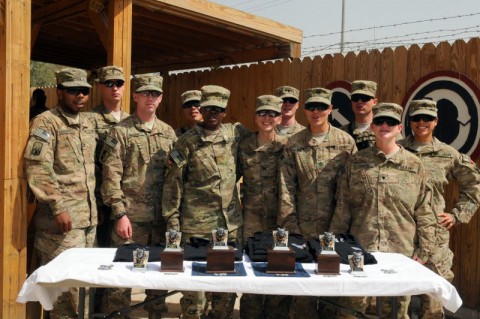 Task Force Lifeliners stand together during the 101st Special Troops Battalion Iron Dawg competition award ceremony, Sept. 28, 2013, at Bagram Air Field, Parwan province, Afghanistan. The purpose of this competition is to promote espirit de corps within the Task Force Lifeliner units. (U.S. Army photo by Sgt. Sinthia Rosario, Task Force Lifeliner Public Affairs)