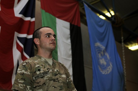 Spc. Cody J. Montalbano, a native of Rochester, N.Y., and mortuary affairs specialist with the 54th Quartermaster Company, stands and observes his team as they meticulously practice preparing a flag, Oct. 17, 2013 at Bagram Air Field, Parwan province, Afghanistan. This final act by the mortuary affairs team signifies and upholds the highest military traditions for fallen heroes. Montalbano and his teammates at the Mortuary Affairs Collection Point Bagram, ensure the Heroes are treated with dignity, reverence and respect. The 54th Quartermaster Company is based out of Fort Lee, Va. (U.S. Army photo by Sgt. Sinthia Rosario)