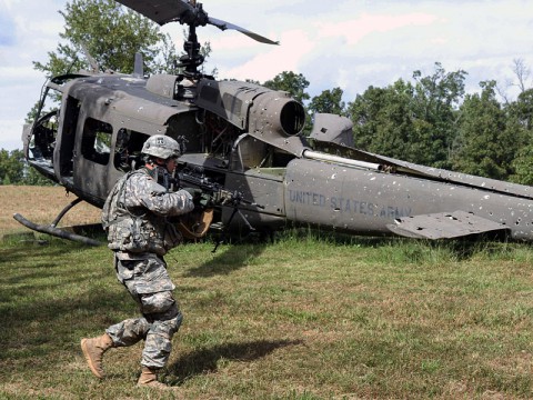 Pfc. Shea Simpson, an infantryman assigned to Company C, 3rd Battalion, 187th Infantry Regiment, 3rd BCT, 101st ABN DIV (AASLT) assaults an objective during a fire team exercise at U.S. Army Fort Campbell, Ky., Sept. 24, 2013. The team exercise was one event that soldiers had to complete during a three day field training exercise, designed to strengthen the battalion’s fire teams. (Spc. Brian Smith-Dutton 3/101 Public Affairs)