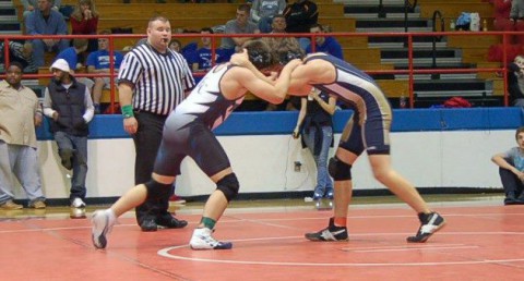 Fort Campbell High 170lb senior wrestler, Ki Ryder, (On left) has committed to join the Wheeling Jesuit University wrestling program.