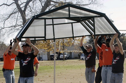 Volunteers working on the Greenhouse for the War Garden Project at Fort Campbell, KY.