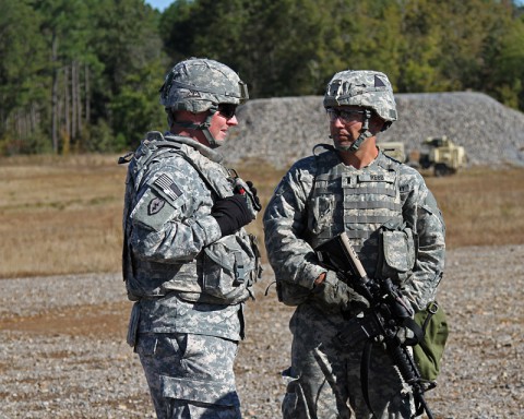 Col. Edward O'Neil, commander of the 108th Air Defense Artillery Brigade, talks to 1st Lt. Mitchel Reed, the platoon leader for the Sentinel platoon, Battery C, 2nd Battalion, 44th Air Defense Artillery, 101st Sustainment Brigade, 101st Airborne Division (Air Assault), during a training mission Oct. 22 at Fort Campbell Ky. (U.S. Army Photo by Sgt. Leejay Lockhart, 101st Sustainment Brigade Public Affairs)