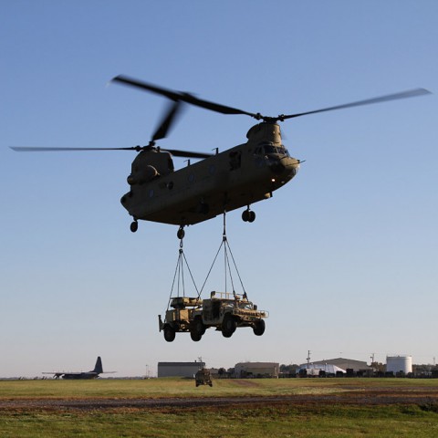 A CH-47 Chinook helicopters from Company B, 6th Battalion, 101st Combat Aviation Brigade, 101st Airborne Division (Air Assault), lifts a Humvee and a AN/MPQ-64A Sentinel radar that soldiers from Battery C, 2nd Battalion, 44th Air Defense Artillery, 101st Sustainment Brigade, sling loaded to the helicopter as part of a training mission Oct. 22 at Fort Campbell, Ky.  (U.S. Army Photo by Sgt. Leejay Lockhart, 101st Sustainment Brigade Public Affairs)