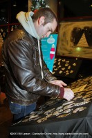 A young man looks at the Christmas ornaments on display at Christmas on the Cumberland