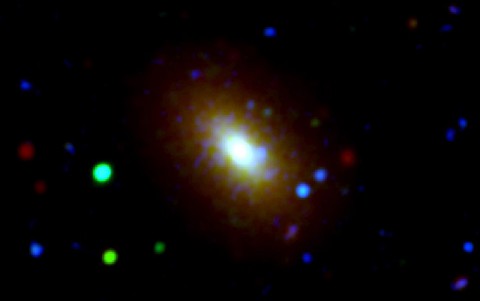 New evidence from NASA's Wide-field Infrared Survey Explorer (WISE) and Galaxy Evolution Explorer (GALEX) missions provide support for the "inside-out" theory of galaxy evolution, which holds that star formation starts at the core of the galaxy and spreads outward. (NASA/JPL-Caltech) New evidence from NASA's Wide-field Infrared Survey Explorer (WISE) and Galaxy Evolution Explorer (GALEX) missions provide support for the "inside-out" theory of galaxy evolution, which holds that star formation starts at the core of the galaxy and spreads outward. (NASA/JPL-Caltech)
