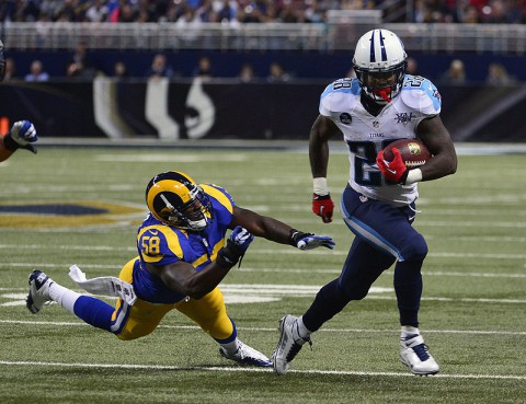 Chris Johnson (28) breaks away from St. Louis Rams outside linebacker Jo-Lonn Dunbar (58) during the second half at the Edward Jones Dome. The Titans defeated the Rams 28-21. (Scott Rovak-USA TODAY Sports)