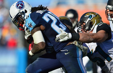 Tennessee Titans running back Chris Johnson (28) is tackled by Jacksonville Jaguars linebacker Paul Posluszny (51) during the second half at LP Field. The Jaguars beat the Titans 29-27. (Don McPeak-USA TODAY Sports)