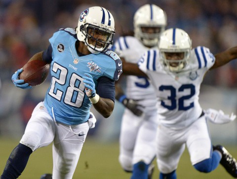 Tennessee Titans running back Chris Johnson (28) is pursued by Indianapolis Colts cornerback Cassius Vaughn (32) on a 30-yard touchdown run in the first quarter against the Indianapolis Colts at LP Field. (Kirby Lee-USA TODAY Sports)