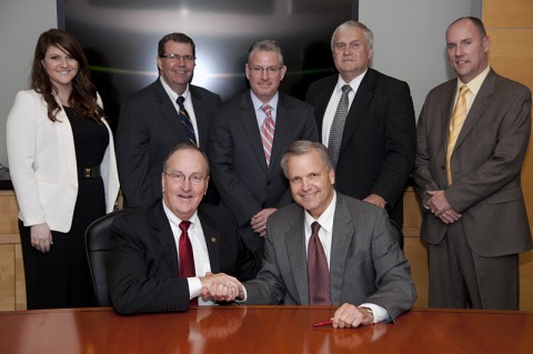 Backrow, left to right: Erin Marshall, FHU web designer; Dr. C.J. Vires, FHU vice president for academics;Dave Clouse, FHU vice president of university advancement; Dr. Dwayne Wilson,FHU executive vice president; Jud Davis, FHU director of marketing and university relations. Front row: FHU President Dr. Joe Wiley and Jackson Foundation President Doug Jackson.