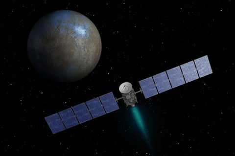 This artist's concept shows NASA's Dawn spacecraft heading toward the dwarf planet Ceres. Dawn spent nearly 14 months orbiting Vesta, the second most massive object in the main asteroid belt between Mars and Jupiter, from 2011 to 2012. It is heading towards Ceres, the largest member of the asteroid belt. When Dawn arrives, it will be the first spacecraft to go into orbit around two destinations in our solar system beyond Earth. (NASA/JPL-Caltech)