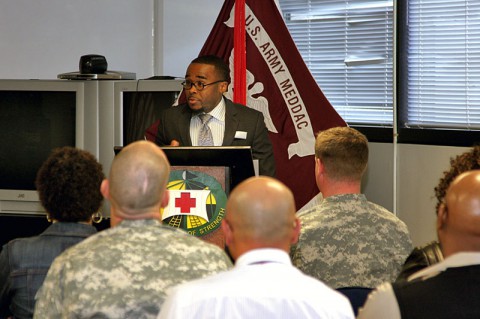 Clarksville Tennessee Pastor Terrence Chandler-Harrison speaks to BACH staff members.