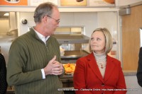 Bill Harpel speaks to Shawna Jones, Regional Director of Restaurant Operations during the Ribbon Cutting Ceremony