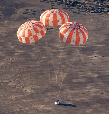 A test version of NASA’s Orion spacecraft touches down in the Arizona desert after its most complicated parachute test to date. (NASA)