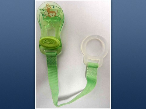 Recalled Playtex green pacifier holder clip