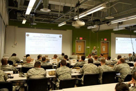 Soldiers with 2nd Battalion, 327th Infantry Regiment, 1st Brigade Combat Team, 101st Airborne Division (Air Assault), are given a class on the new Tactical Communications and Protective System hearing device Feb. 21 at the Kinnard Mission Training Complex here. The brigade is the first in the Army to receive the new system which is designed to provide active hearing protection while allowing them to maintain situational awareness on the battlefield. (Sgt. Jon Heinrich/U.S. Army)