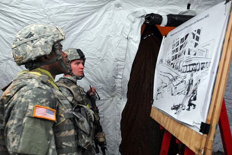 1st Lt. Andre Shinda and Staff Sgt. Robert Herendeen, both assigned to 3rd Battalion, 187th Infantry Regiment, 3rd Brigade Combat Team “Rakkasans,” 101st Airborne Division (Air Assault), memorize a picture during the ‘Best Rakkasan’ competition mystery event here, Feb. 20, 2014. The competition was held was the first of its kind and was designed to measure the overall proficiency of selected teams and award them with the title of ‘Best Rakkasan’ through competitive events. (Sgt. Brian Smith-Dutton/U.S. Army)