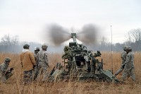 Soldiers with 2nd Battalion, 320th Field Artillery Regiment, 1st Brigade Combat Team, 101st Airborne Division, fire their M777A2 155mm Howitzer during their battalion’s confidence shoot Jan. 31 at Firing Point 32A here. (Photo by Sgt. Jon Heinrich)