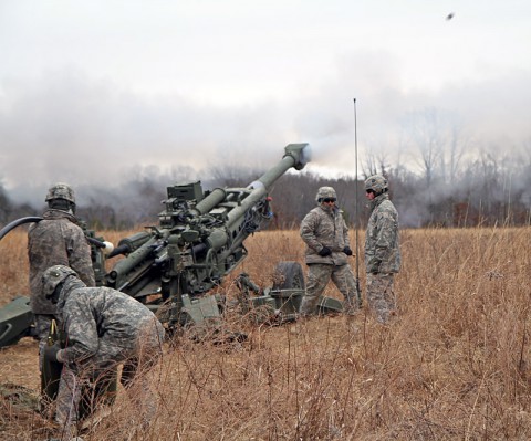 Soldiers with 2nd Battalion, 320th Field Artillery Regiment, 1st Brigade Combat Team, 101st Airborne Division, fire their M777A2 155mm Howitzer during their battalion’s confidence shoot Jan. 31 at Firing Point 32A here. (Photo by Sgt. Jon Heinrich)